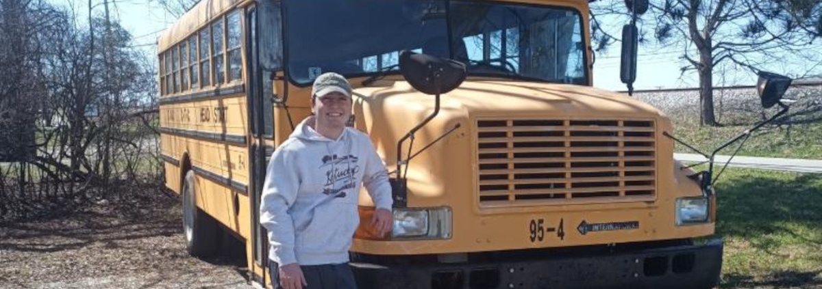 ITM Co-op Student Weston Graham with his Bus